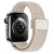 Apple Watch Series 11 46mm med beige nylonarmband, sidovy