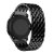 Svart metallarmband med fjärilsspänne monterat på Garmin Vivoactive 4 – sned vy