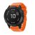 Garmin Fenix 7X Pro med orange silikonarmband – framifrån